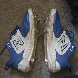 New Balance Blue and White Athletic Cleats